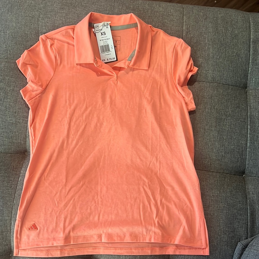 Orange adidas golf shirt